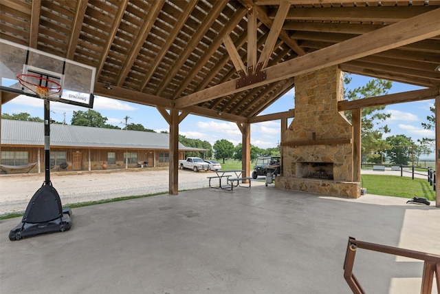295 Lindsey Ln, Stephenville, TX 76401 - view of patio / terrace featuring an outdoor stone fireplace