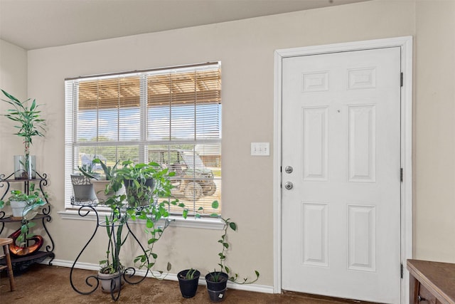 295 Lindsey Ln, Stephenville, TX 76401 - carpeted foyer with baseboards