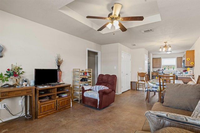 295 Lindsey Ln, Stephenville, TX 76401 - living area with a chandelier, concrete floors, and a ceiling fan