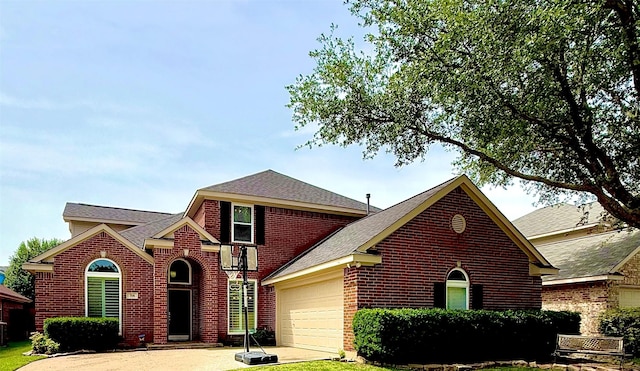 708 W Lonesome Dove Trl, Arlington, TX 76001 - traditional home featuring brick siding, an attached garage, roof with shingles, and concrete driveway