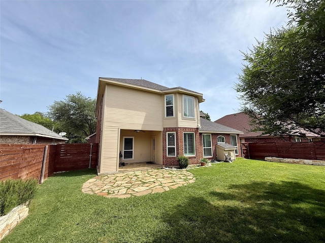 708 W Lonesome Dove Trl, Arlington, TX 76001 - rear view of property featuring a patio, brick siding, and roof with shingles
