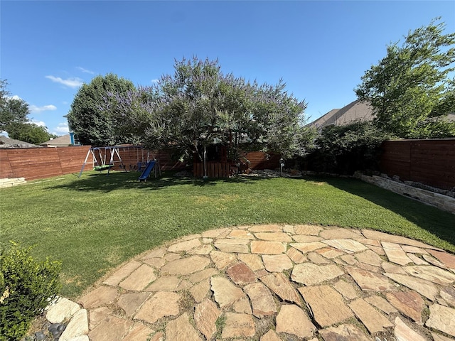708 W Lonesome Dove Trl, Arlington, TX 76001 - view of yard with a patio area and a playground