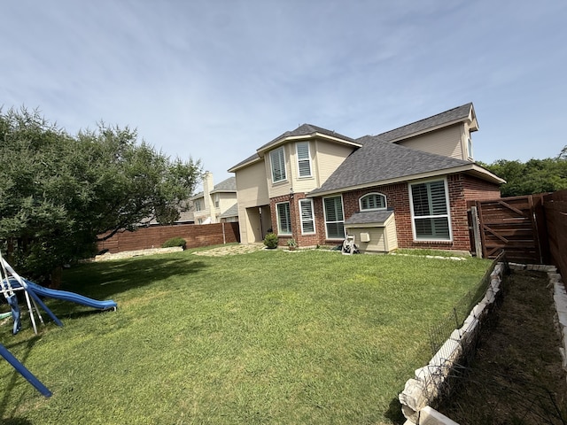 708 W Lonesome Dove Trl, Arlington, TX 76001 - back of house featuring brick siding and a shingled roof