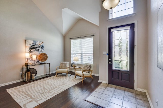 851 Sibyl Ln, Prosper, TX 75078 - foyer entrance featuring baseboards, wood finished floors, and lofted ceiling