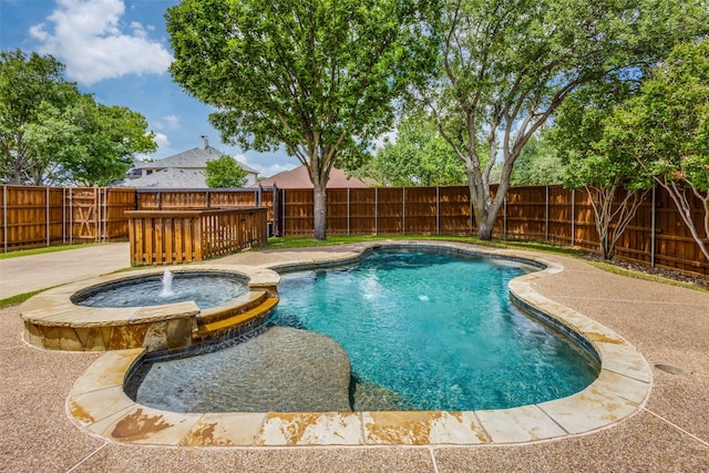 3717 Drew Dr, Frisco, TX 75035 - view of pool featuring a pool with connected hot tub and a fenced backyard