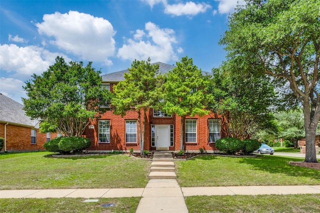 3717 Drew Dr, Frisco, TX 75035 - view of front of house featuring a front yard and brick siding