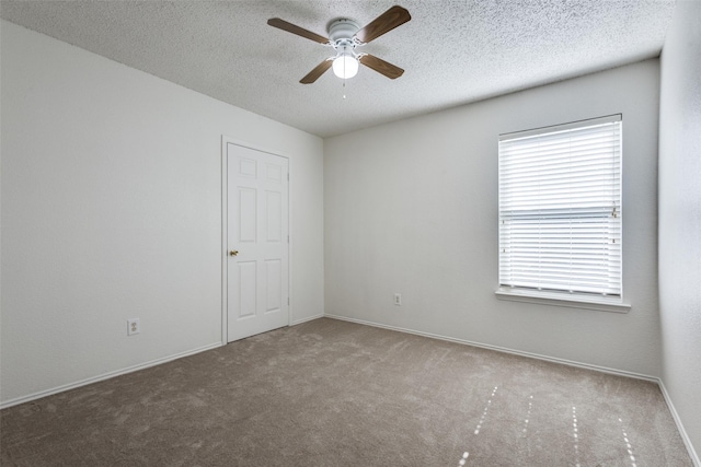 3717 Drew Dr, Frisco, TX 75035 - carpeted spare room featuring a ceiling fan, a textured ceiling, and baseboards
