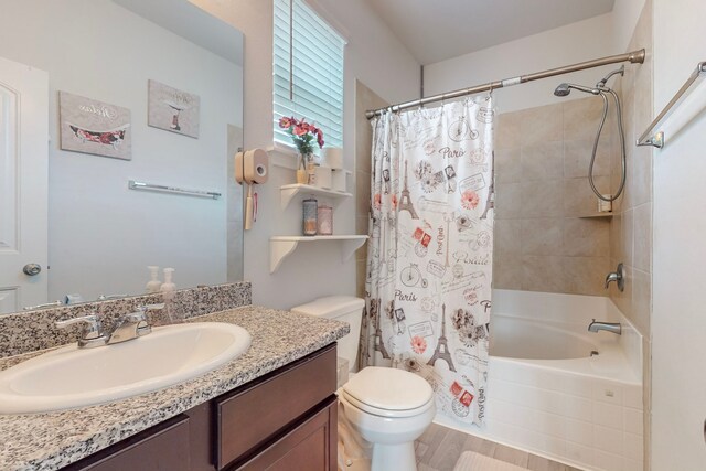 7448 Crossfire Trl, Fort Worth, TX 76112 - bathroom featuring toilet, shower / bathtub combination with curtain, vanity, and wood finished floors