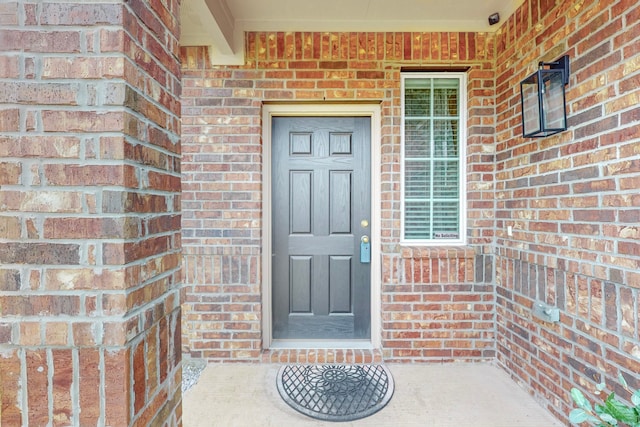 7448 Crossfire Trl, Fort Worth, TX 76112 - property entrance with brick siding