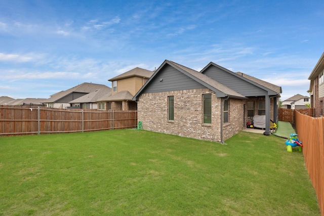 3935 Chesapeake Ln, Crandall, TX 75114 - back of house featuring brick siding