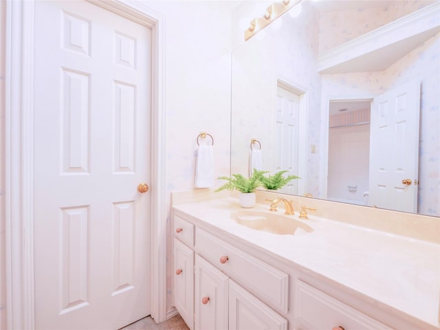 4541 Salerno Cir, Plano, TX 75093 - bathroom with vanity and wallpapered walls