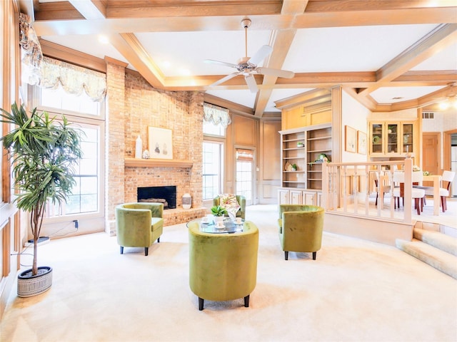 4541 Salerno Cir, Plano, TX 75093 - living room featuring coffered ceiling, carpet flooring, ceiling fan, a brick fireplace, and beam ceiling