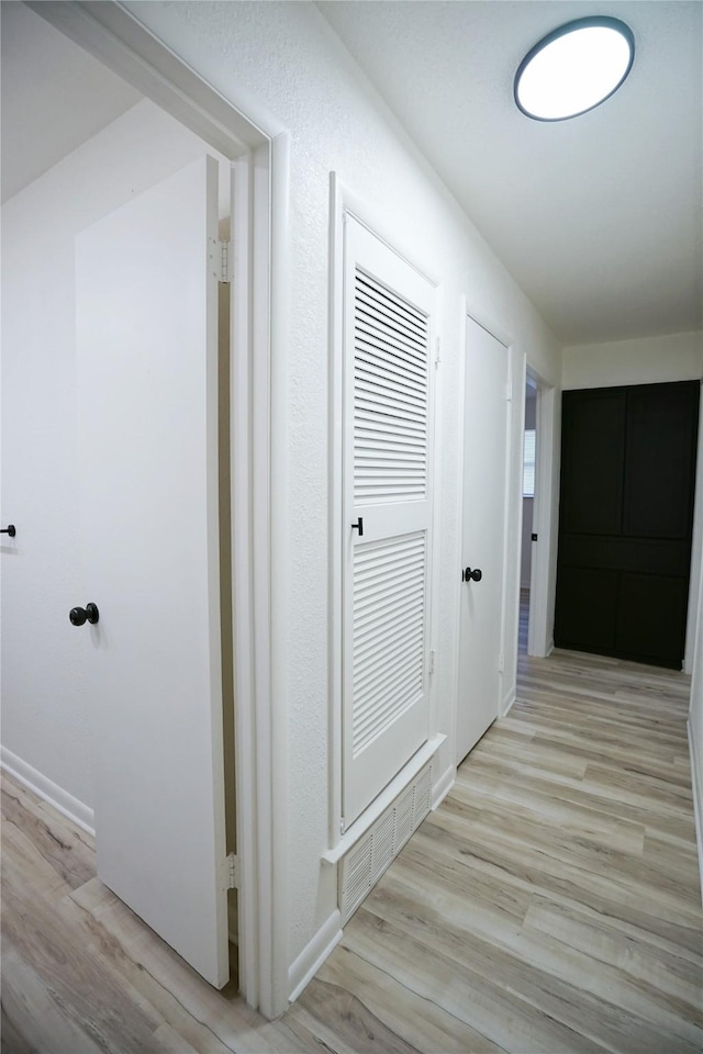 2409 Sunset Ln, Burleson, TX 76028 - hall with light wood finished floors