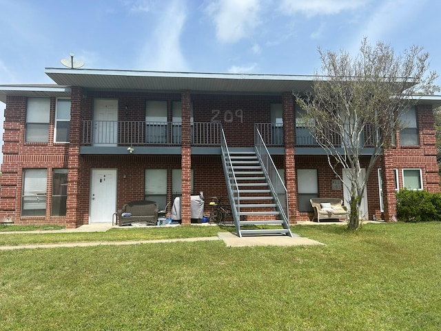 209 Joyce St, Weatherford, TX 76085 - view of building exterior featuring stairway