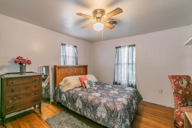 109 Honeysuckle, Paradise, TX 76073 - bedroom with wood finished floors and ceiling fan