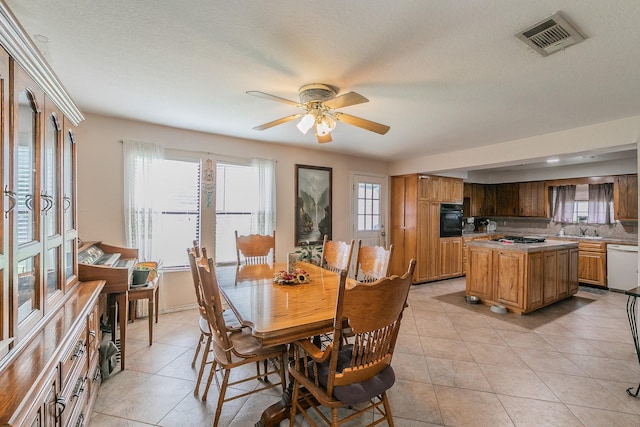 109 Honeysuckle, Paradise, TX 76073 - dining area featuring light tile patterned floors and ceiling fan