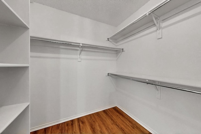 232 Cotton Wood Ct, Rockwall, TX 75032 - spacious closet featuring wood finished floors