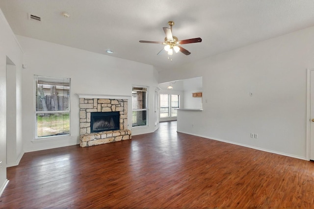 232 Cotton Wood Ct, Rockwall, TX 75032 - unfurnished living room featuring a ceiling fan, wood finished floors, a fireplace, and baseboards