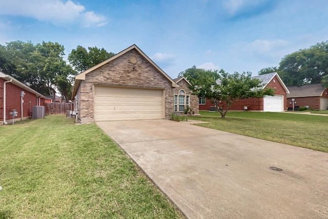 232 Cotton Wood Ct, Rockwall, TX 75032 - view of front of property with central AC, brick siding, driveway, and a garage