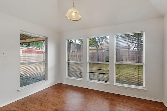 232 Cotton Wood Ct, Rockwall, TX 75032 - unfurnished dining area with healthy amount of natural light, wood finished floors, and baseboards