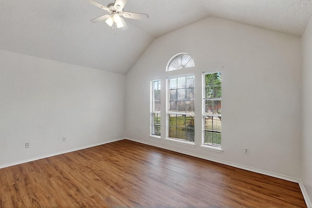 232 Cotton Wood Ct, Rockwall, TX 75032 - unfurnished room with wood finished floors, ceiling fan, vaulted ceiling, and baseboards