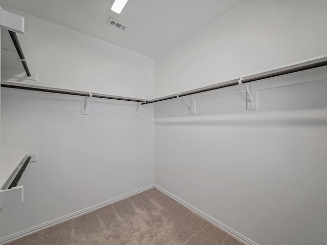 240 Harper St, Irving, TX 75063 - walk in closet featuring carpet flooring
