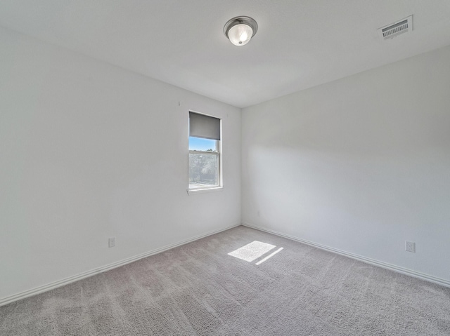 240 Harper St, Irving, TX 75063 - carpeted spare room with baseboards