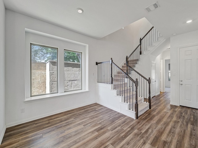 240 Harper St, Irving, TX 75063 - foyer with wood finished floors, stairs, recessed lighting, and baseboards