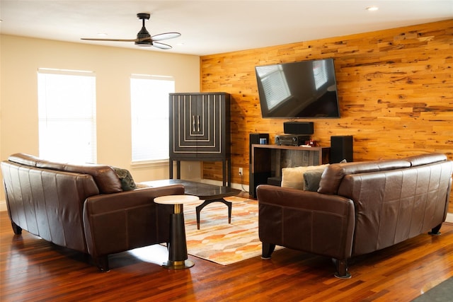 6318 White Oaks Ln, Frisco, TX 75035 - living room with ceiling fan, wooden walls, wood finished floors, and recessed lighting