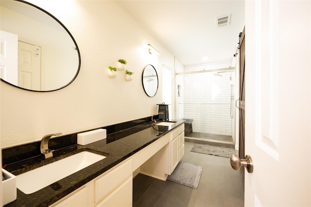 6318 White Oaks Ln, Frisco, TX 75035 - bathroom featuring a shower stall, double vanity, and tile patterned flooring