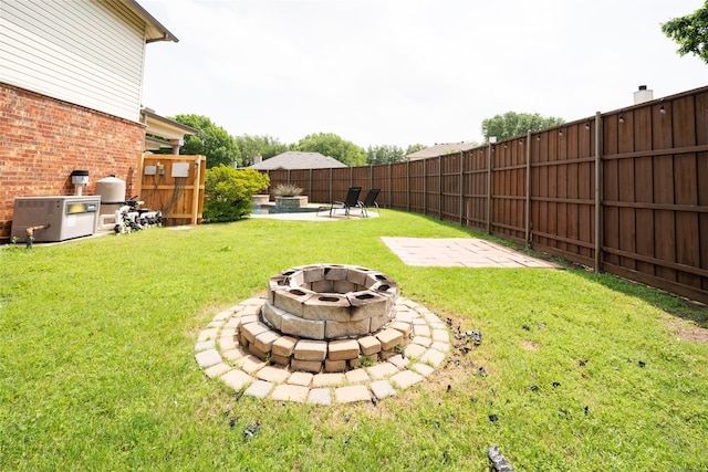 6318 White Oaks Ln, Frisco, TX 75035 - view of yard featuring an outdoor fire pit and a patio area