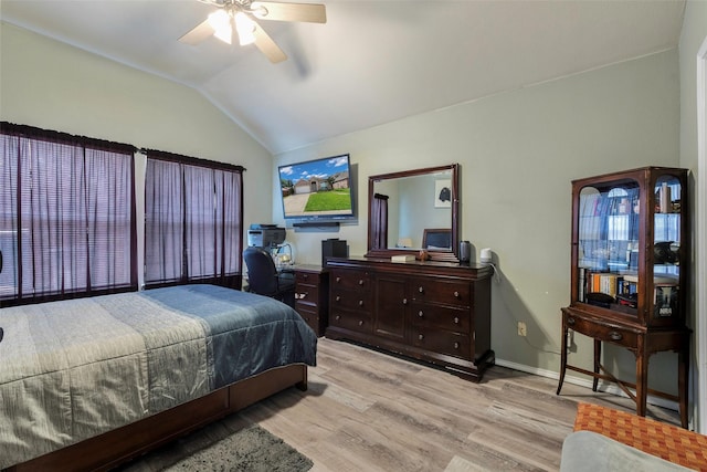 809 Fox Run Trl, Saginaw, TX 76179 - bedroom featuring vaulted ceiling, light wood finished floors, a ceiling fan, and baseboards