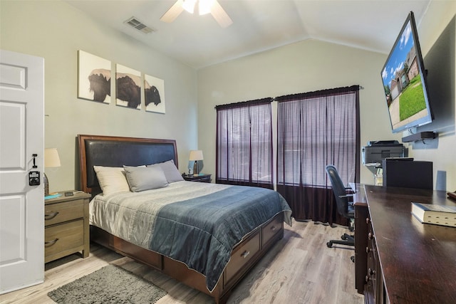 809 Fox Run Trl, Saginaw, TX 76179 - bedroom with light wood finished floors, an office area, vaulted ceiling, and a ceiling fan