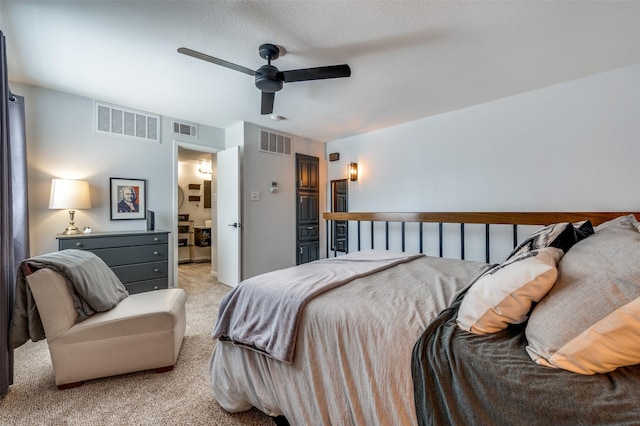 7640 W Greenway Blvd Unit 8L, Dallas, TX 75209 - bedroom featuring light carpet, ensuite bathroom, and a ceiling fan