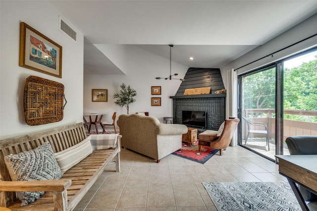 7640 W Greenway Blvd Unit 8L, Dallas, TX 75209 - living room featuring light tile patterned floors, a fireplace, and lofted ceiling