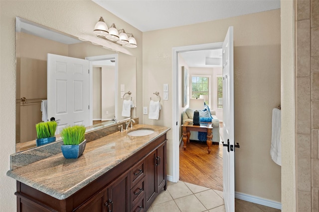 710 Eagles Landing Blvd, Oak Point, TX 75068 - bathroom with vanity, tile patterned flooring, ensuite bathroom, and baseboards