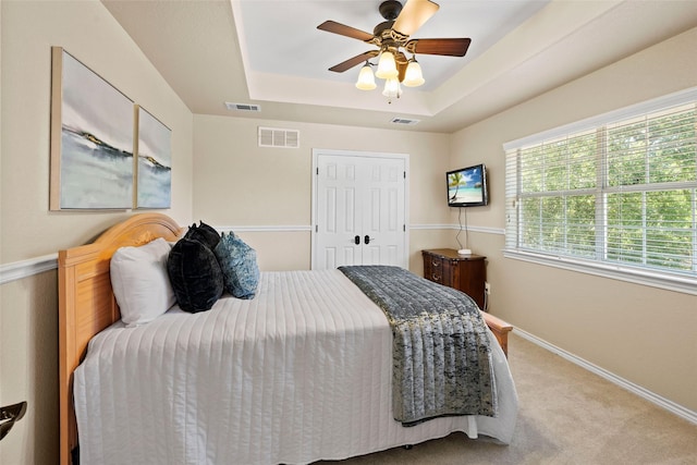 710 Eagles Landing Blvd, Oak Point, TX 75068 - carpeted bedroom featuring a raised ceiling, baseboards, and ceiling fan