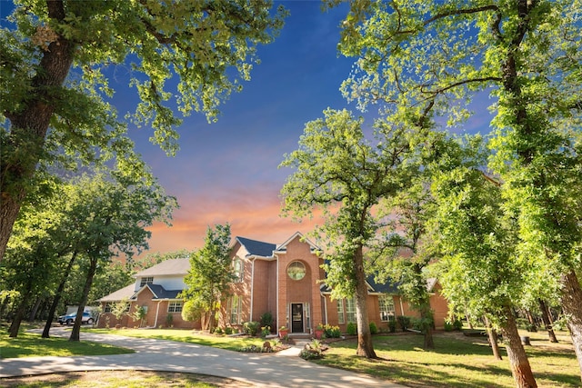 710 Eagles Landing Blvd, Oak Point, TX 75068 - view of front of home featuring brick siding and a yard
