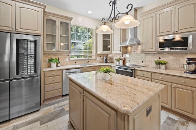 710 Eagles Landing Blvd, Oak Point, TX 75068 - kitchen with stainless steel appliances, wall chimney exhaust hood, a sink, light stone counters, and recessed lighting