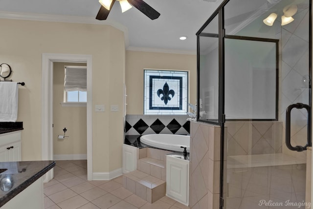 bathroom featuring a garden tub, tile patterned flooring, vanity, a ceiling fan, and a stall shower