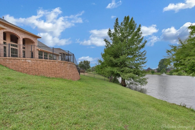 view of yard with a water view