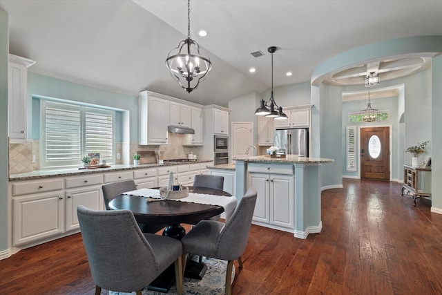 413 Sloan Creek Pkwy, Fairview, TX 75069 - dining area featuring lofted ceiling, dark wood-style flooring, baseboards, arched walkways, and a chandelier