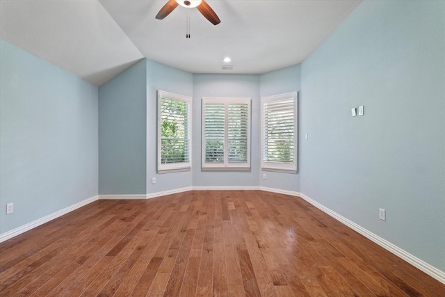 413 Sloan Creek Pkwy, Fairview, TX 75069 - spare room with healthy amount of natural light, wood finished floors, a ceiling fan, and baseboards