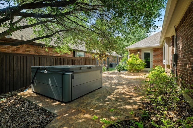 413 Sloan Creek Pkwy, Fairview, TX 75069 - fenced backyard with a hot tub and a patio