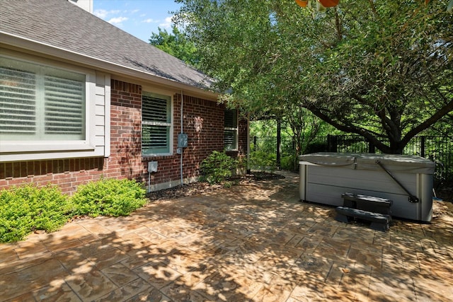 413 Sloan Creek Pkwy, Fairview, TX 75069 - view of patio / terrace featuring a hot tub and a fenced backyard