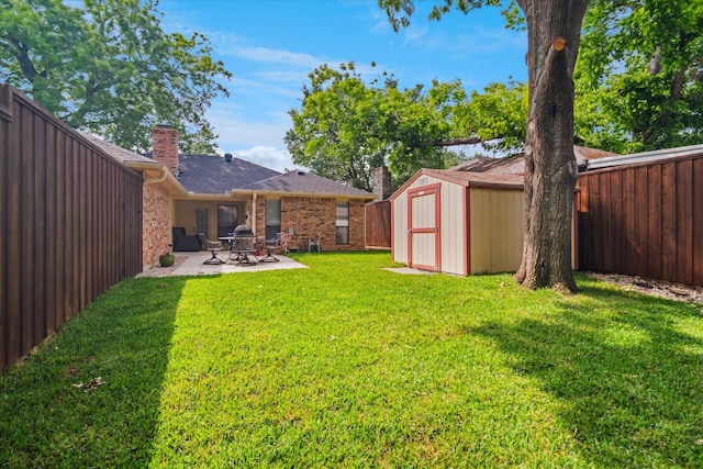 4021 Tracey Trl, Rowlett, TX 75088 - view of yard featuring a storage unit, a patio area, and an outbuilding