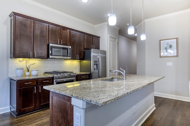 5005 Meridian Ln Unit 3102, Addison, TX 75001 - kitchen featuring appliances with stainless steel finishes, a sink, dark wood-style floors, baseboards, and light stone counters