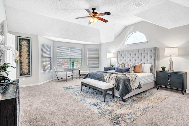 3501 Thorp Springs Dr, Plano, TX 75025 - bedroom with carpet floors, multiple windows, lofted ceiling, baseboards, and a textured ceiling