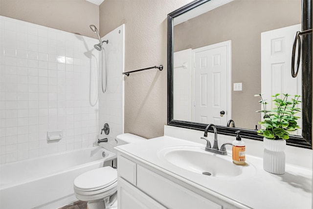 3501 Thorp Springs Dr, Plano, TX 75025 - full bath with a textured wall, toilet, vanity, and shower / bathtub combination