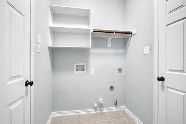 3501 Thorp Springs Dr, Plano, TX 75025 - laundry area featuring hookup for an electric dryer, hookup for a washing machine, baseboards, gas dryer hookup, and tile patterned floors